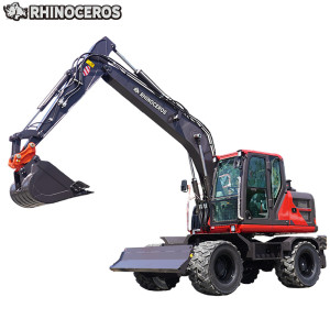 Wiellader met houtgrijper